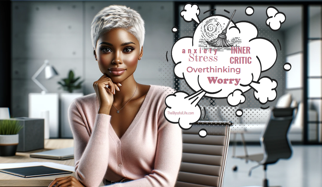 Black Woman sitting in modern office with a broom sweeping clearing mental clutter words in a word cloud. Article by Samantha Gregory the Self-Care Alchemist and founder of The Blyssful Life.